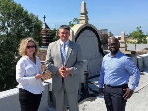 HUD official Faye Mobley joins Wilson Housing Authority President and CEO Kelly Vick and James Crouell (right), the housing authority’s manager for Varita Court, in a tour of the building including inspecting the condition of the roof which is going to be replaced.