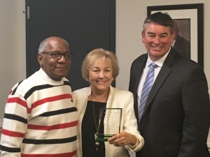 Outgoing Wilson Housing Authority Commissioner Judy Weatherington is recognized for her more than 10 years of service on the housing authority’s Board of Commissioners by Board Chair Thomas Eatmon, left, and Kelly Vick, the authority’s president and CEO.